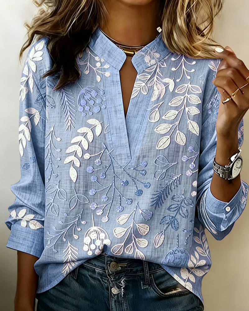 Women's floral high-neck blouse, close-up detail