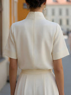 Women's stand collar blouse in white, back view