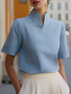Short sleeve stand collar blouse in light blue, front view