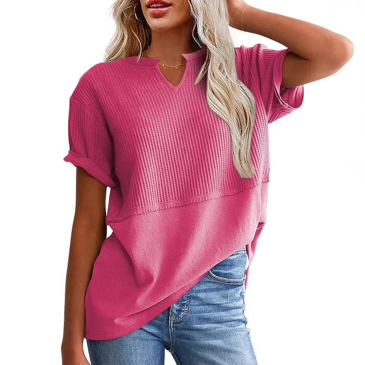 Oversized waffle knit top close-up, textured fabric and V-neckline | Alba Muse