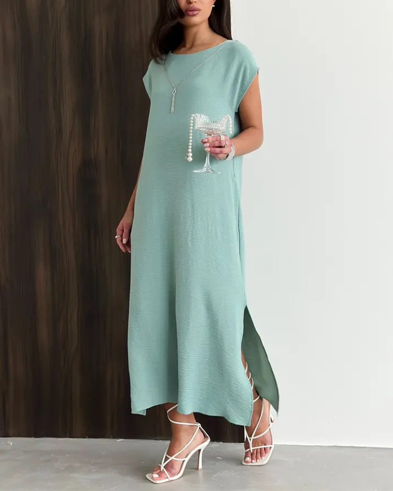 Loose slit maxi dress in white, back view