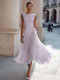 Women's pleated occasion dress, available in multiple colours