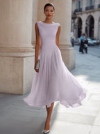 Women's pleated occasion dress, available in multiple colours