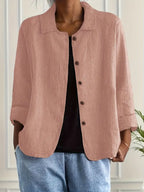 Front view of women's relaxed button front lightweight jacket
