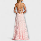Women's floral lace maxi dress styled for a garden party or beach wedding