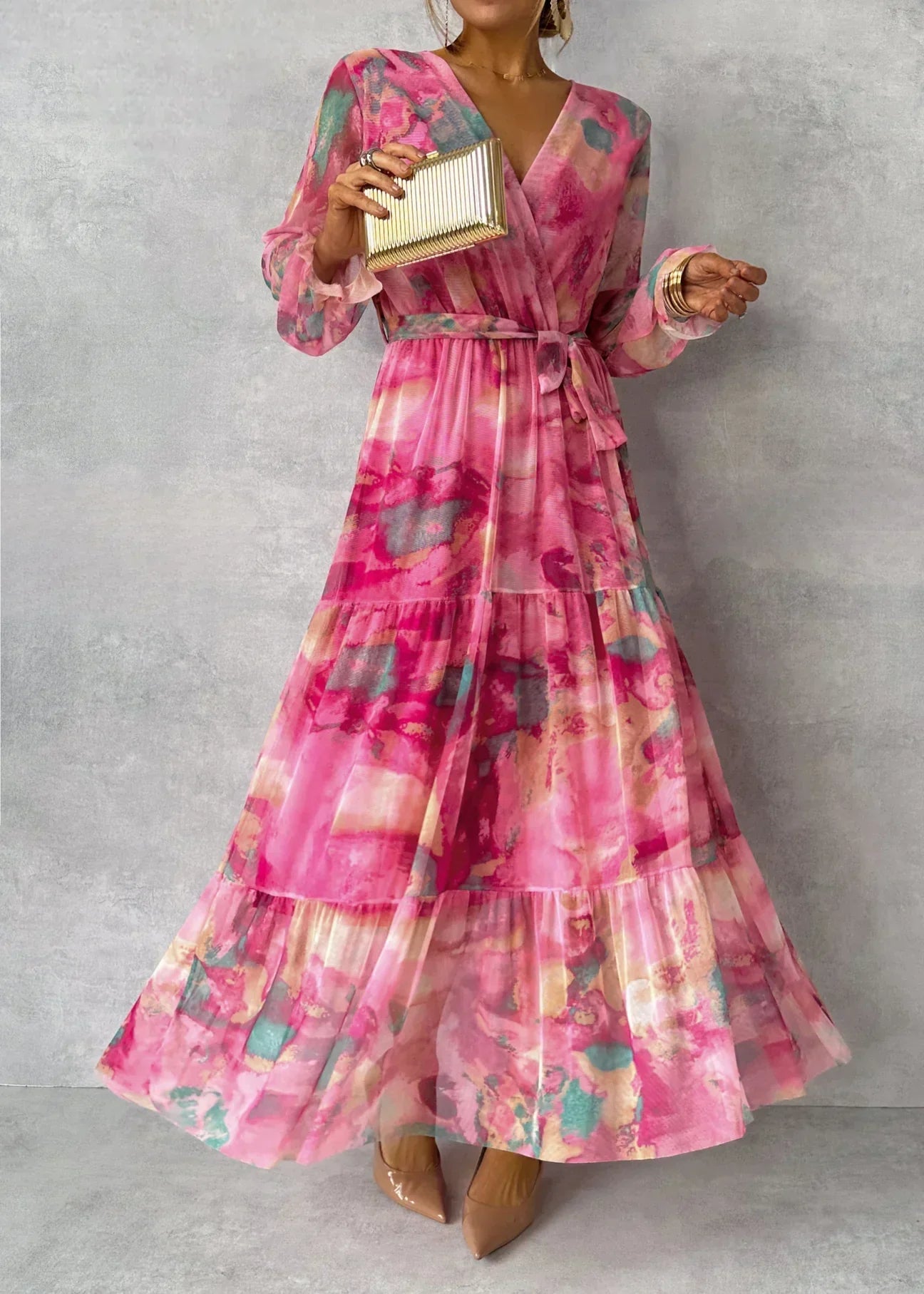 Women's floral pleated belted maxi dress, front view on model