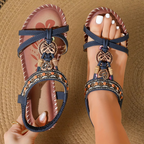 Bohemian flat sandals with golden pearl detail on model, lifestyle shot