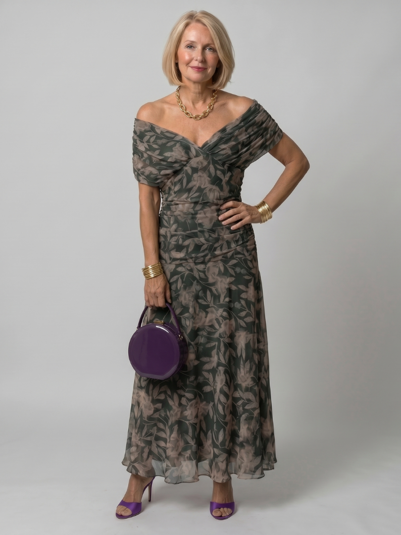 Off-shoulder flared midi dress styled for garden party, lifestyle shot