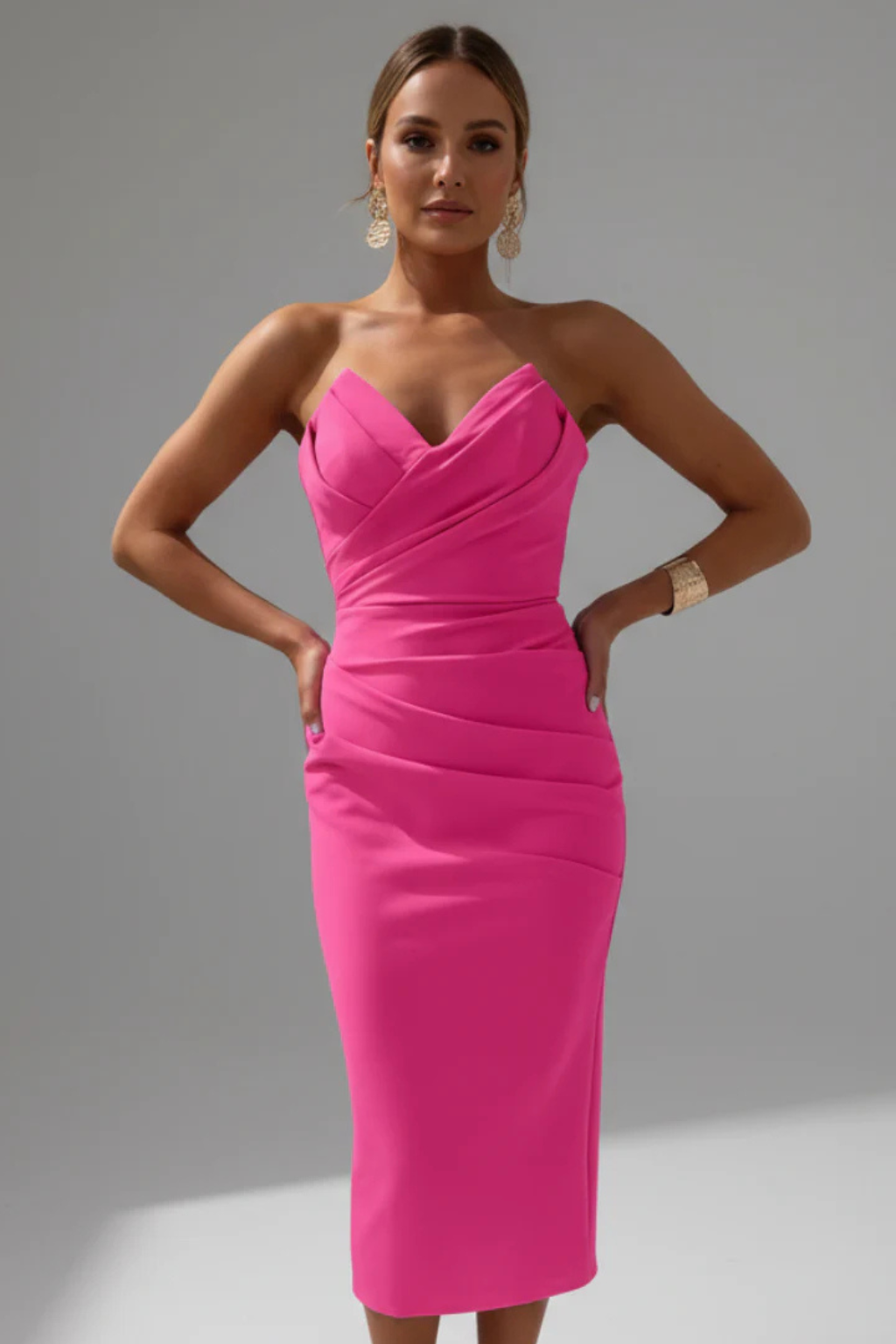 Women's elegant strapless midi dress wedding guest full view