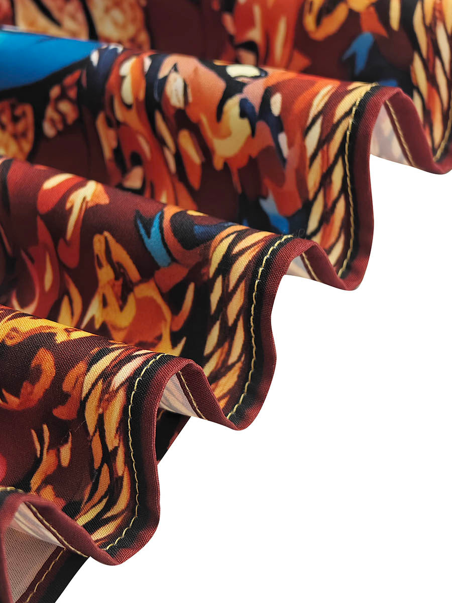 Close-up of the printed fabric edge and stitching on the midi dress