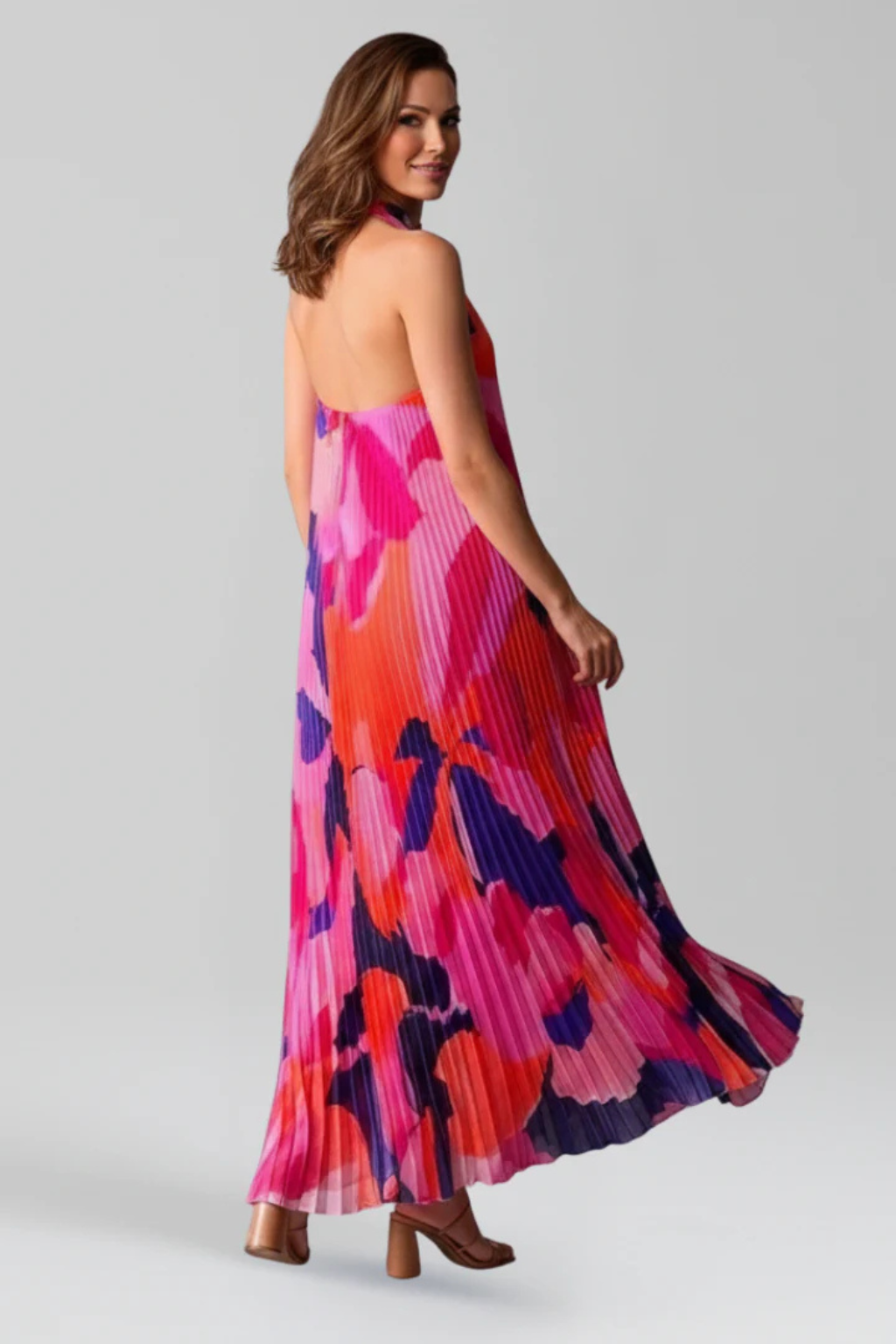 Women's sleeveless pleated maxi dress with multi-colour print, full length view