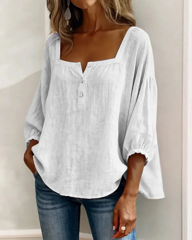 Half-button boho shirt in white, close-up neckline and button detail | Alba Muse