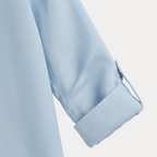 Women's classic button-up shirt, worn open over casual outfit