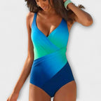 Summer holiday one piece swimsuit with crossover wrap design, lifestyle beach shot