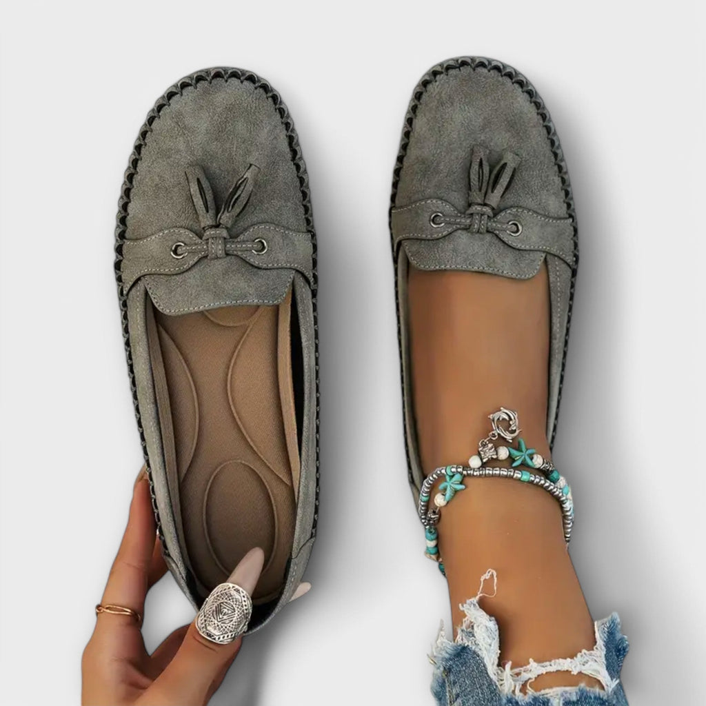 Women's suede moccasin loafers styled for casual everyday wear
