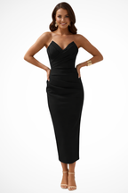 Women's strapless ruched dress styled with heels