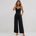Women's spaghetti strap V-neck jumpsuit showing micro-pleated texture detail
