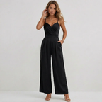 Women's spaghetti strap V-neck jumpsuit showing micro-pleated texture detail