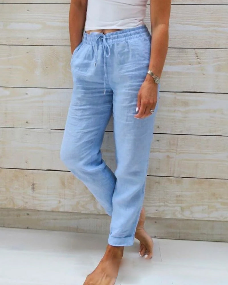 Stretchy lightweight casual trousers in blue, front view