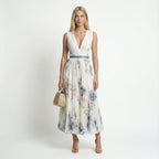 Women's floral pleated maxi dress in white – sleeveless V-neck front view
