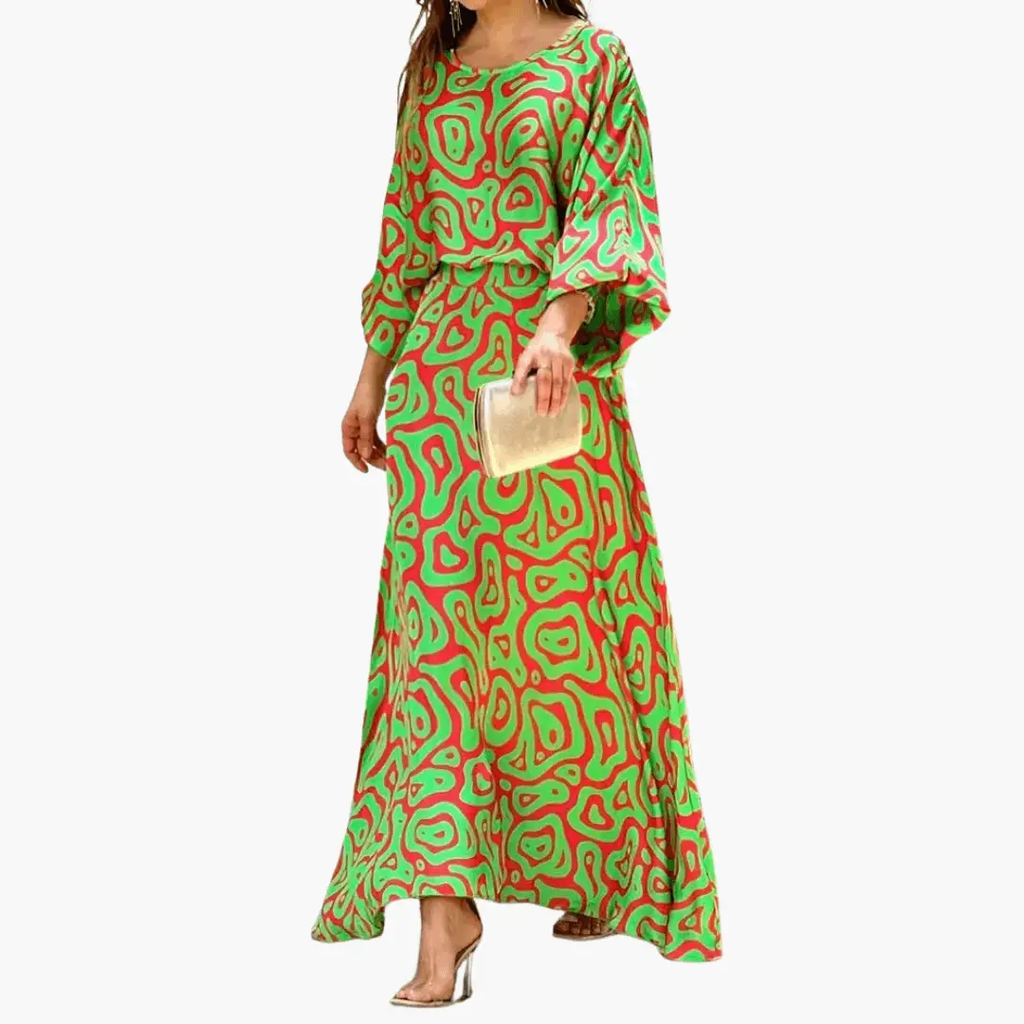Women's boho print flowing maxi dress, vibrant summer wedding guest style, front view
