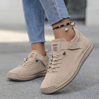 Side view of women's orthopaedic slip-on sneakers with velcro strap