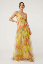 Women's floral chiffon dress, pleated skirt drape close-up
