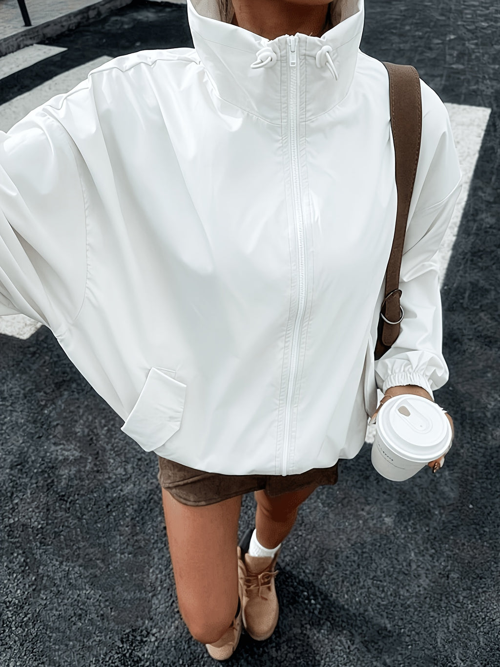 White drawstring windbreaker jacket, front view