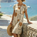 Women's abstract geometric print shift mini dress, front view