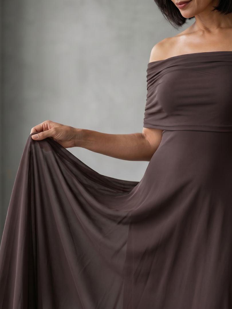 Off-shoulder draped midi dress in green, front view