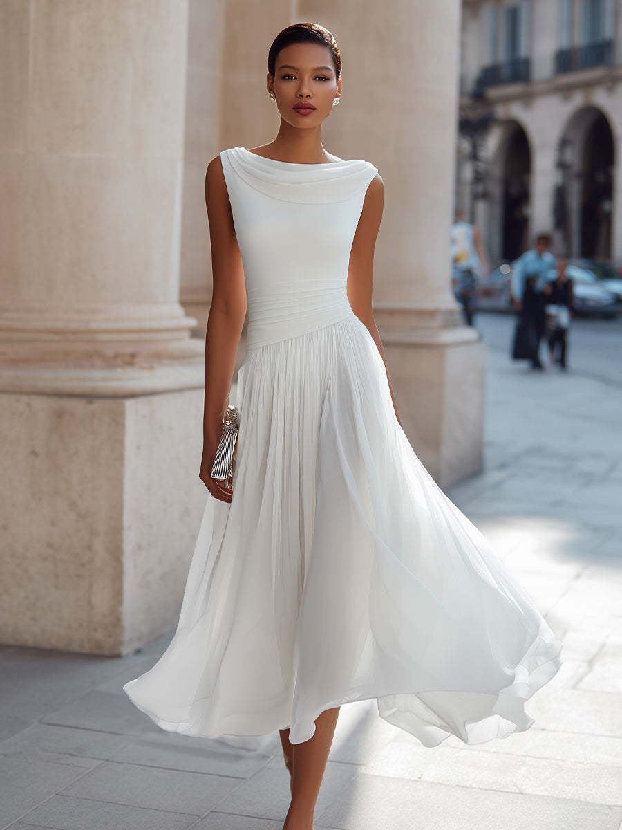 Sleeveless pleated midi dress in white, full length wedding guest view