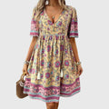 Elegant relaxed fit midi dress in green, front view