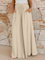 Women's wide leg pants detail showing drawstring waist