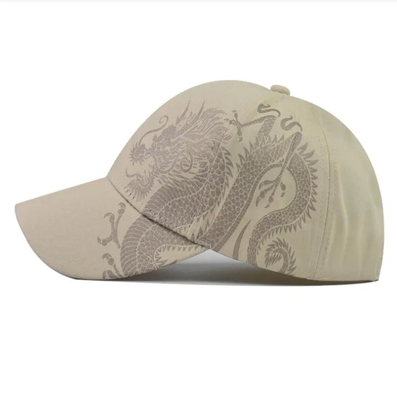 Beige Year of the Dragon Cap, side view showing dragon design across crown and brim