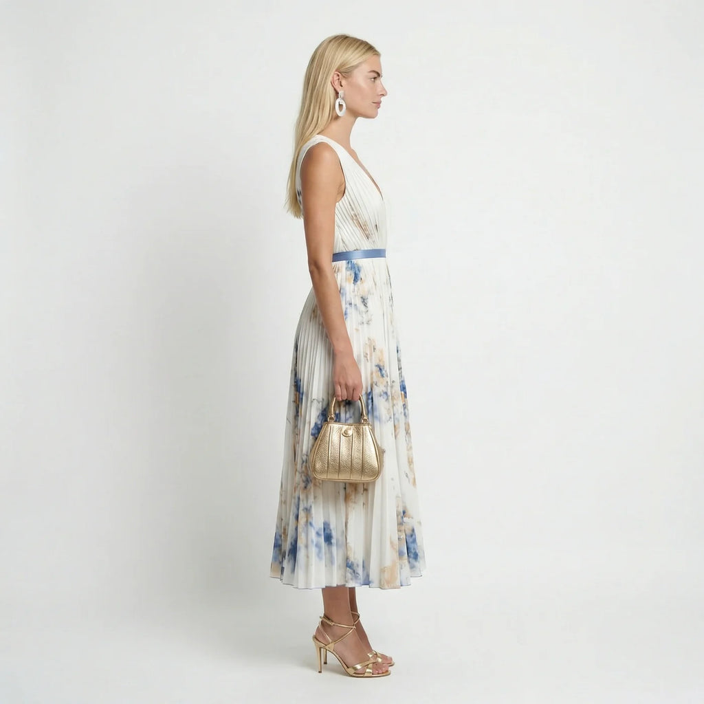 Women's white floral pleated maxi dress – flowing skirt detail