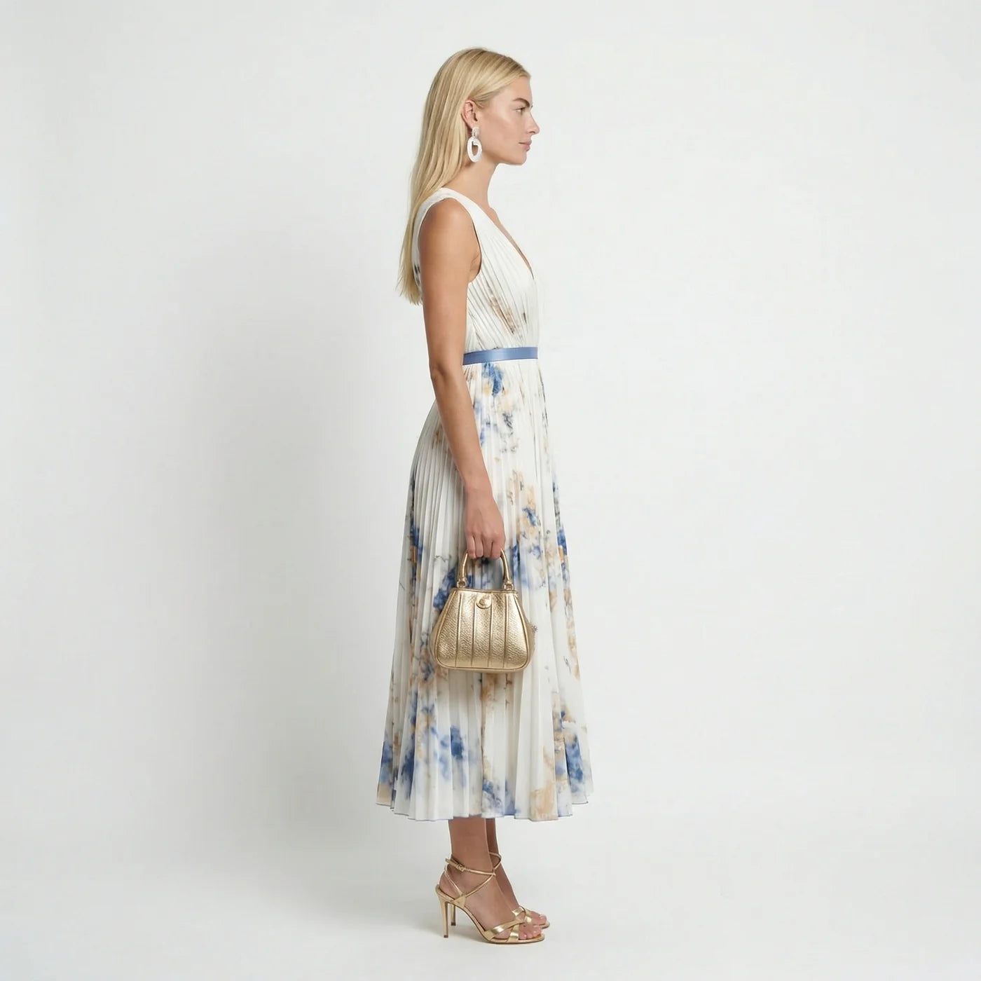 Women's white floral pleated maxi dress – flowing skirt detail