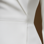 Women's structured white dress with high collar, back view