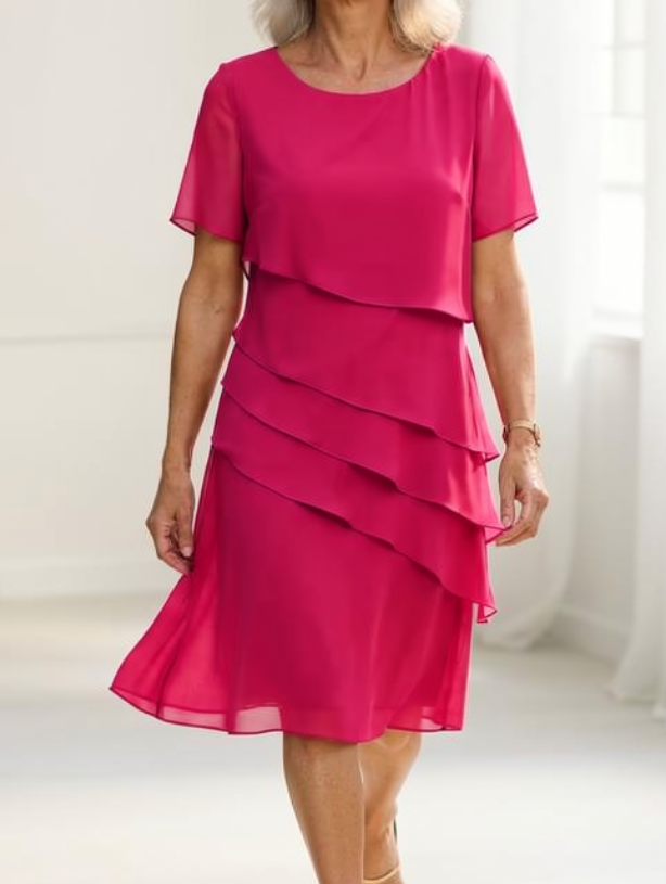 Women's ruffle midi dress, styled for a daytime occasion