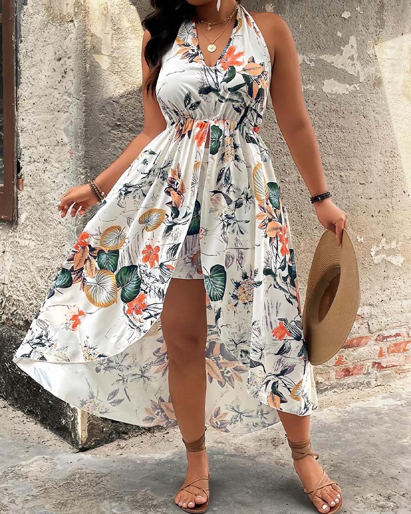 Printed halter neck sleeveless A line mini dress and shorts set in green, front view