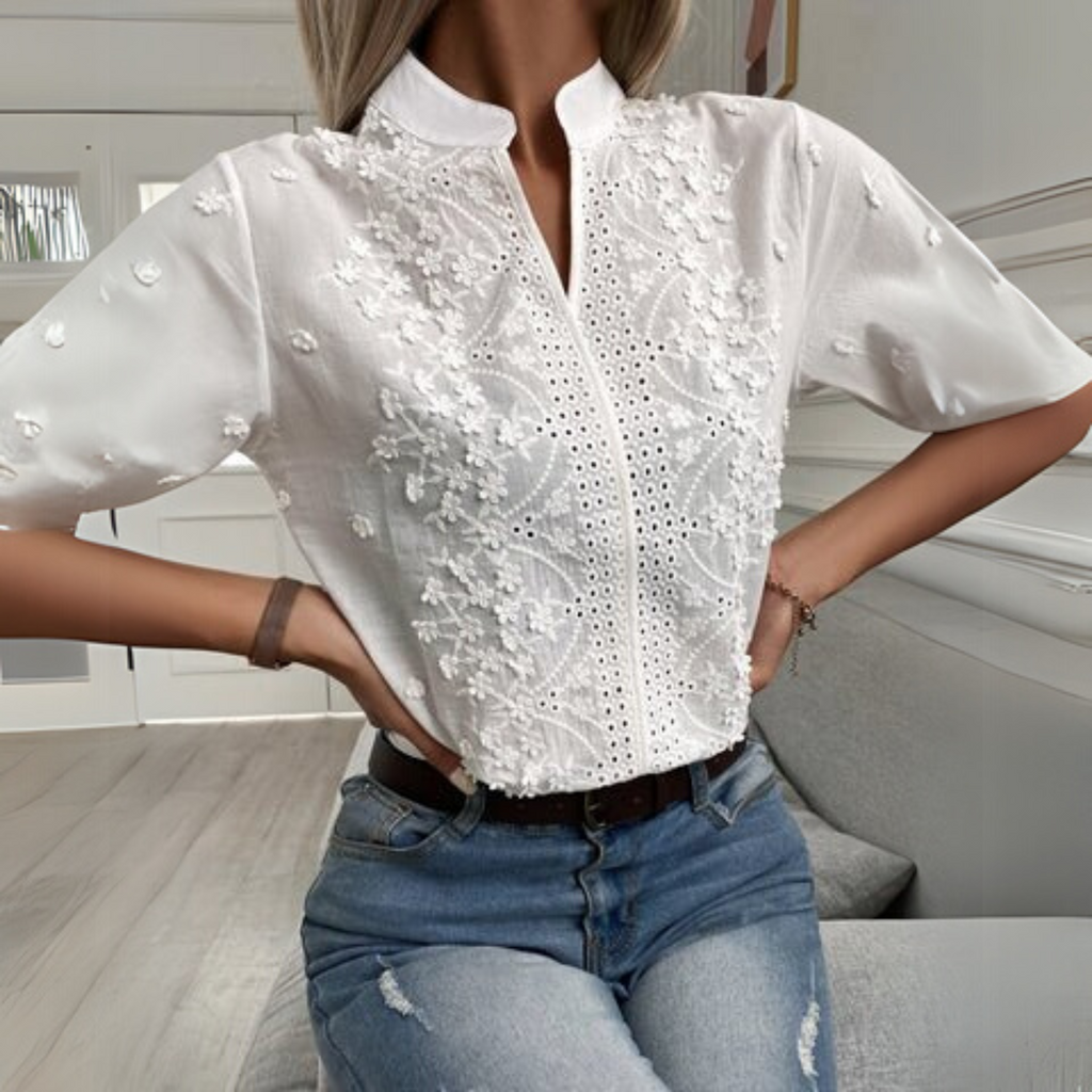 White blouse with embroidered cutout front panel and standing collar | Alba Muse