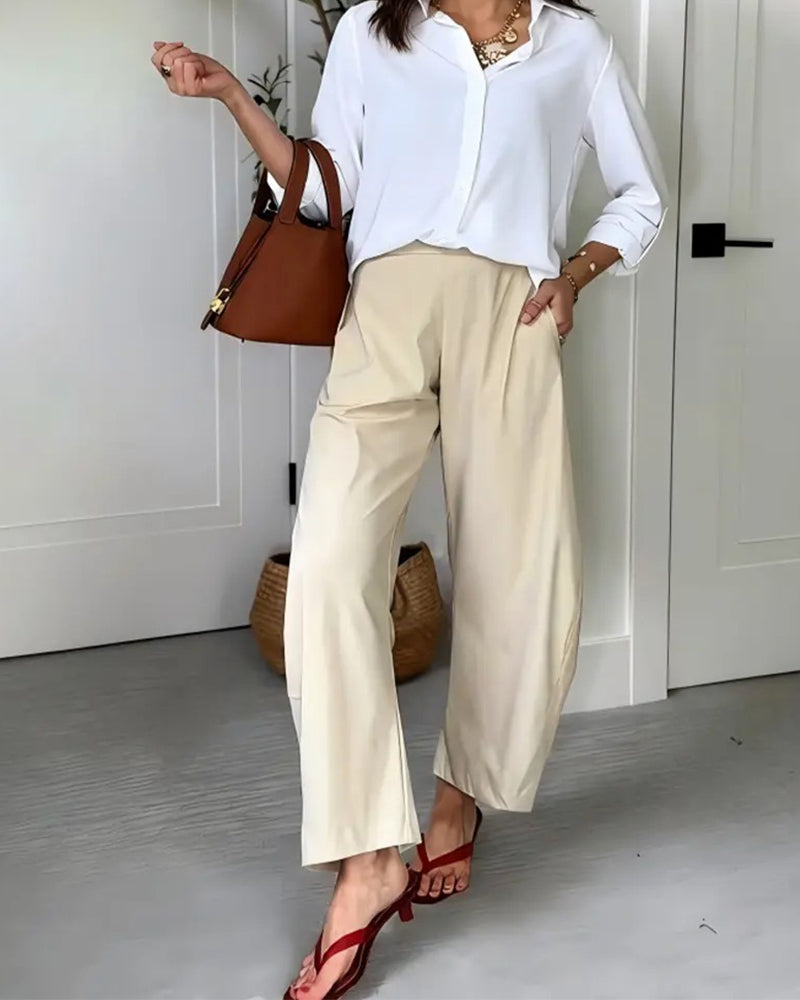 Cropped trousers with hanging pockets, back view