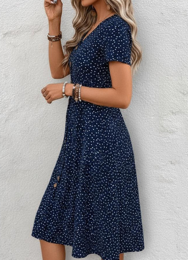 Polka dot button-front V-neck midi dress showing side detail