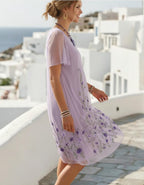 Women's lavender floral embroidered mesh overlay midi dress, back view