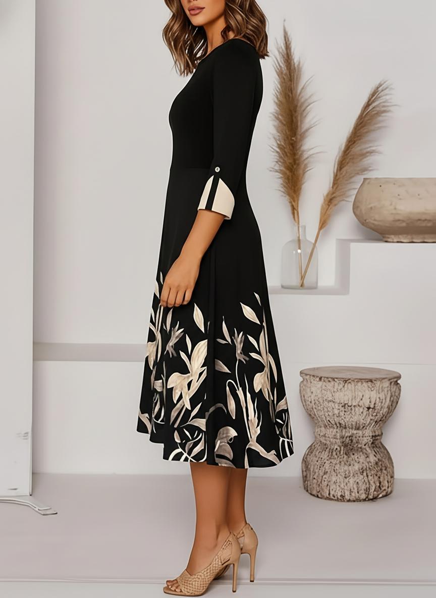 Floral A-line midi dress with three-quarter sleeves, side view