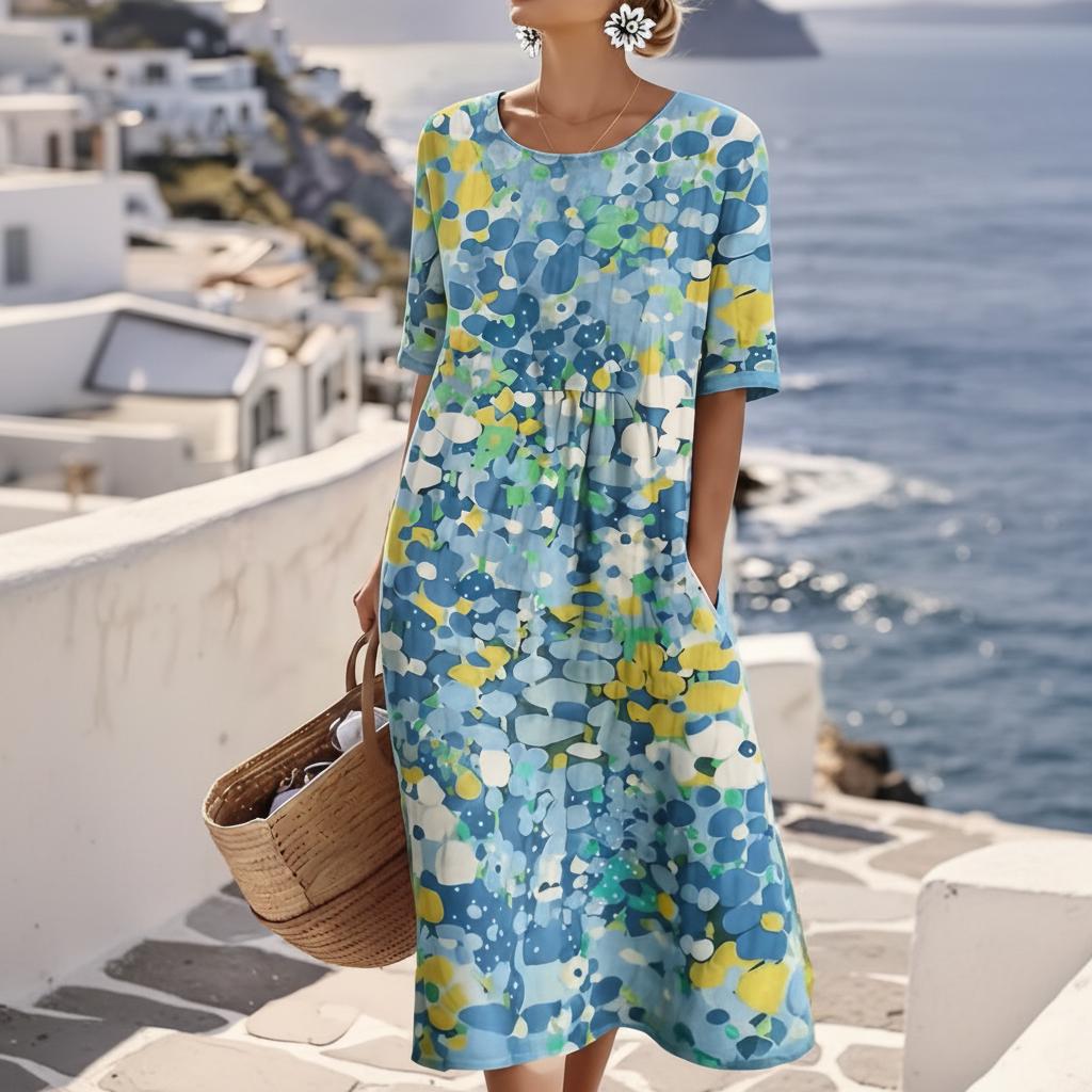Blue abstract floral print short sleeve midi dress, front view on model