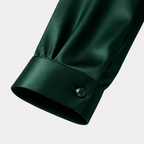 Women's satin blouse in green – cuff detail close up
