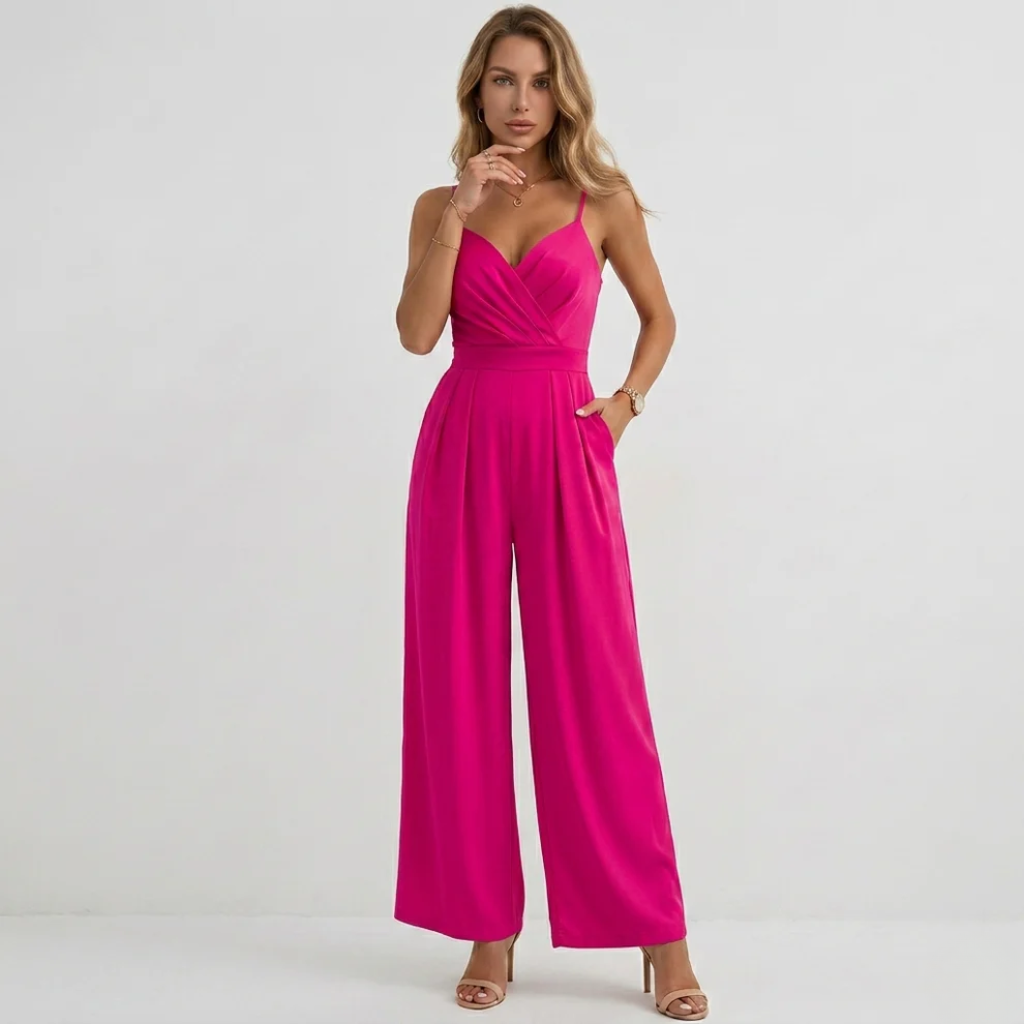 Women's elegant spaghetti strap pleated jumpsuit, movement shot showing wide leg
