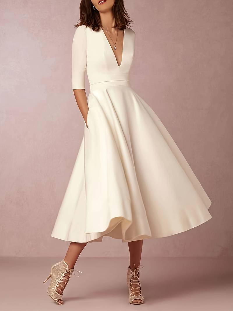 Side view of women's flared midi dress flowing movement