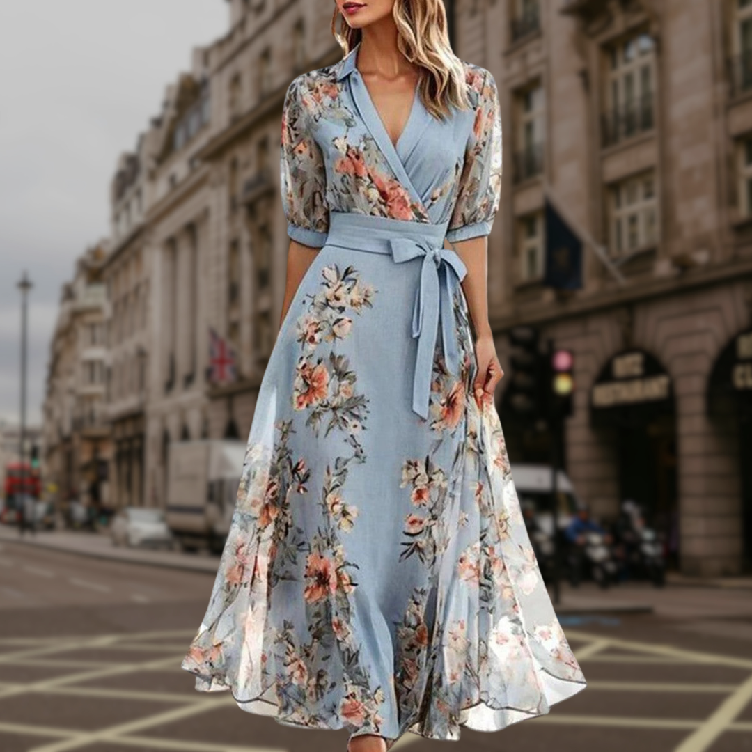 Women's floral flowing maxi dress, perfect for garden parties and summer celebrations, back view