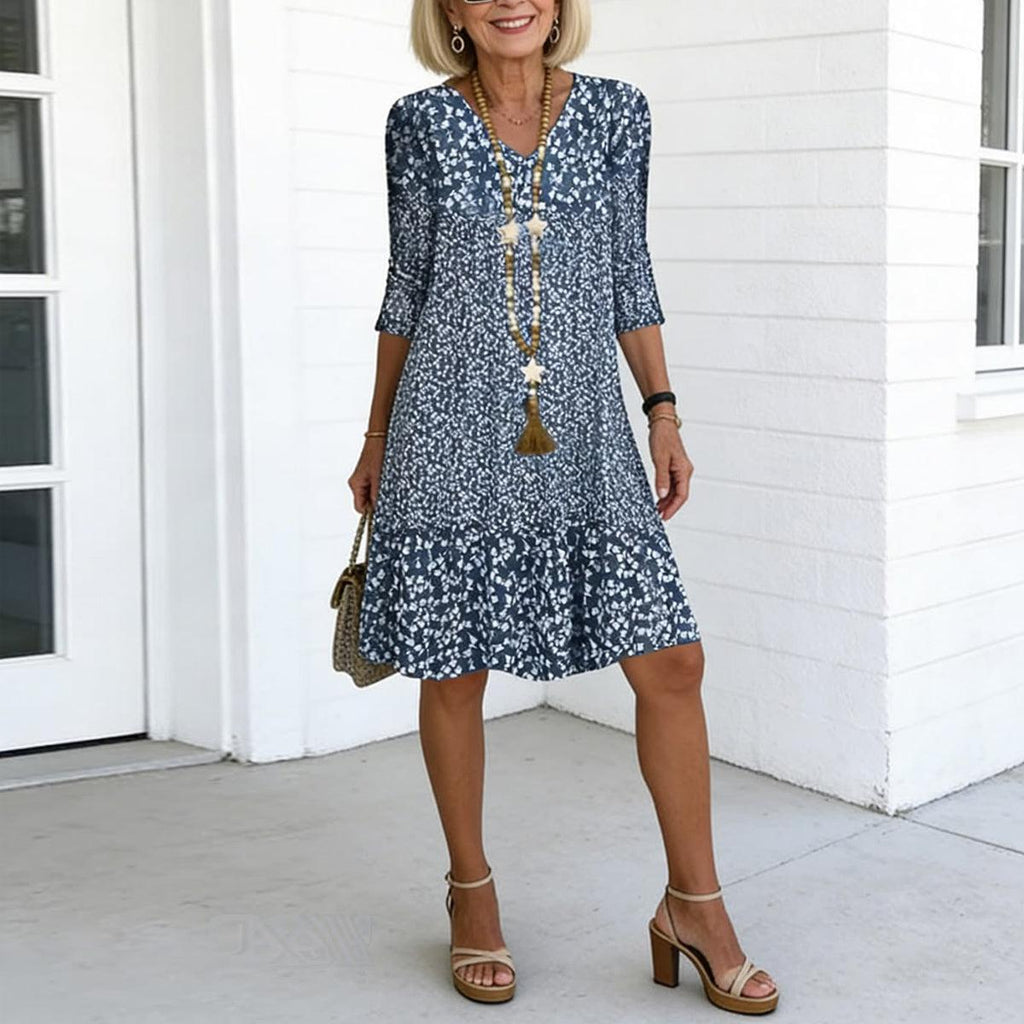 Women's blue floral print V-neck ruffle hem midi dress, front view